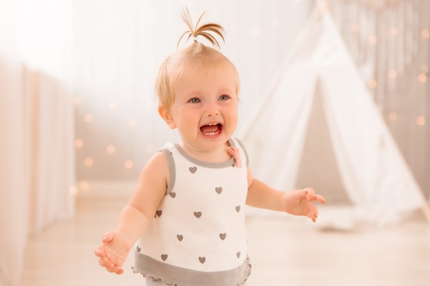 baby playing in the nursery