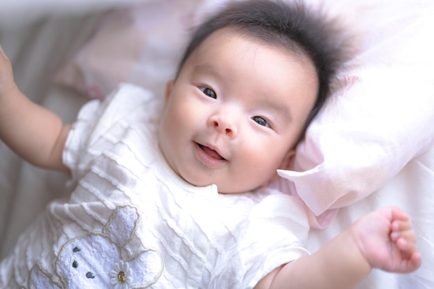 Baby playing with curtains