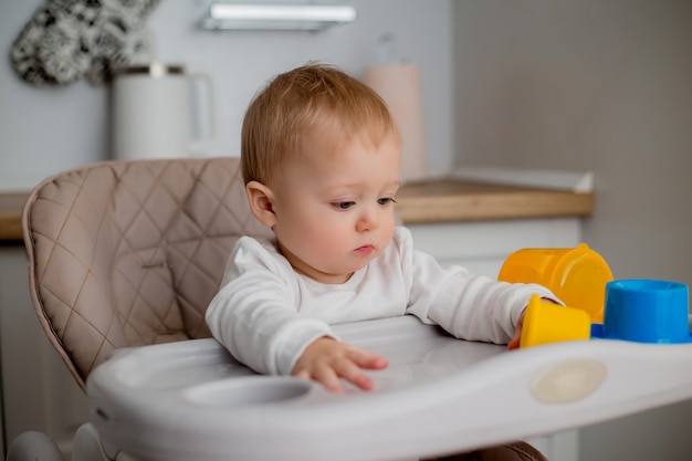 baby playing with educational toys at home