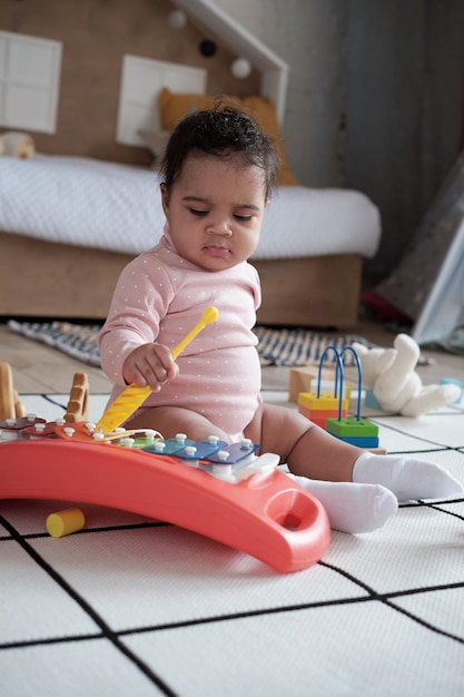 Baby playing with toys