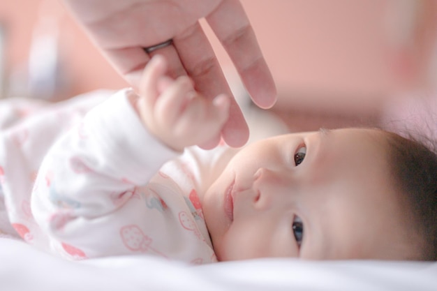 Baby recognizing hands