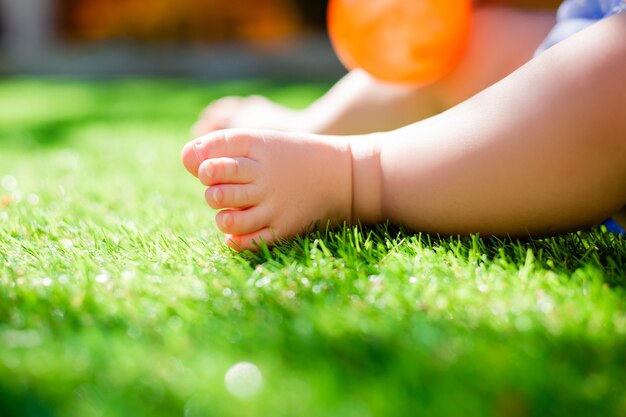 Baby's feet on a summer day