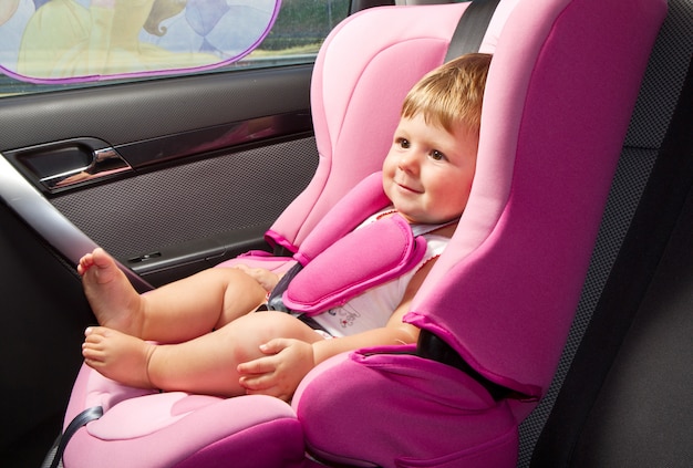 Baby in a safety car seat