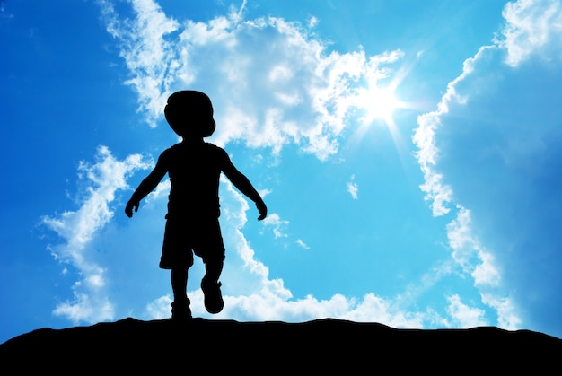 Baby silhouette on sky background