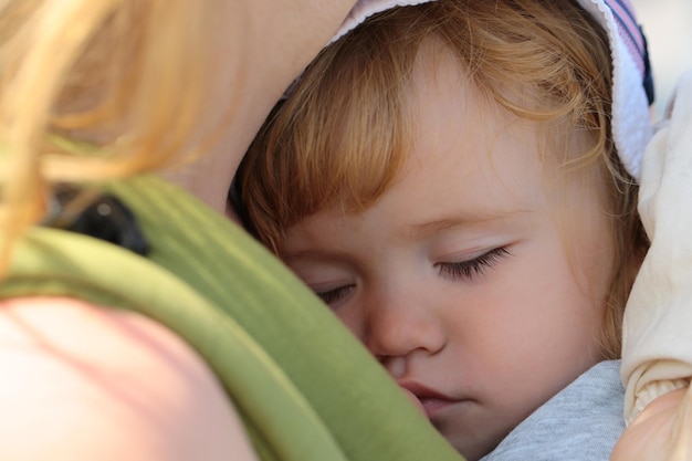 Baby sleeping in the bed kids sleepy face child sleep closeup face