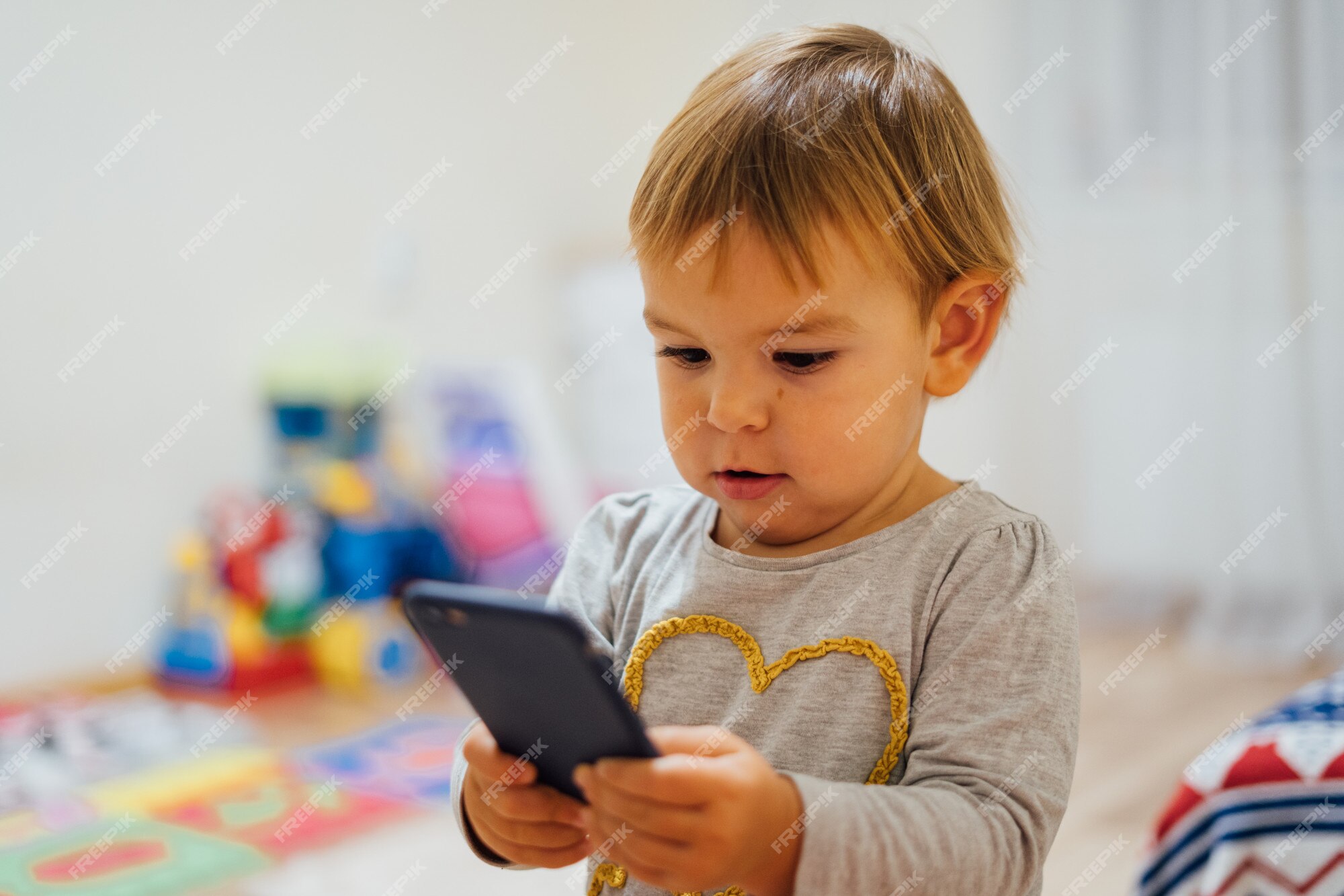 Hooked on Phone. Family Play Mobile Phone Game at Home. Staying Connected  with Cell Phone. Family Communication Stock Photo - Image of beard, baby:  180857330