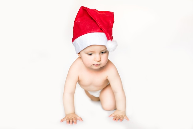 baby wearing santa hat