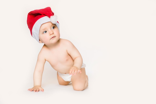 baby wearing santa hat