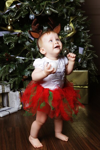 Baby with christmas background Happy New Year