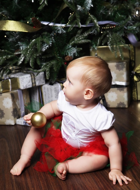 Baby with christmas background Happy New Year