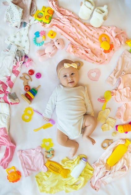 Baby with clothes and accessories