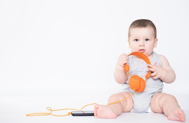 Baby with headphone young DJ