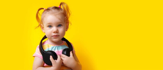 Baby with headphones panoramic layout