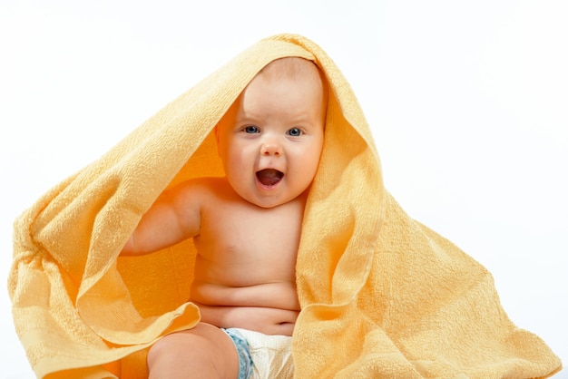 Baby in yellow towel