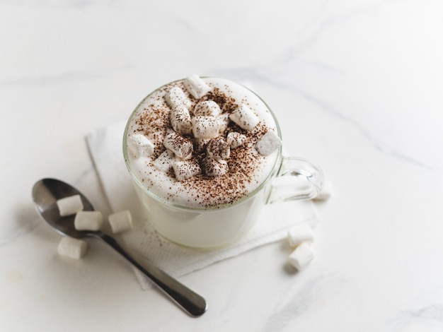 Babyccino on marble tabletop, copy space