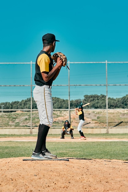 back baseball and pitch ball for game team exercise or competition practice on field softball player boy and teen athlete training for sports fitness and ready to throw for performance outdoor