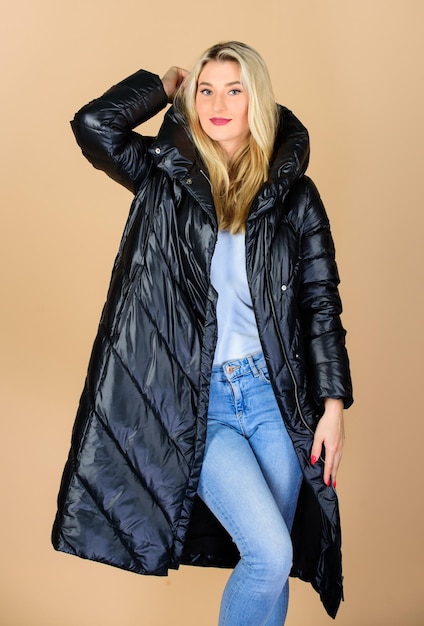 Back in black finding right winter jacket is essential to\
enjoyable winter season gorgeous fashionable blonde girl enjoy\
wearing bright jacket with hood warm coat comfortable down\
jacket