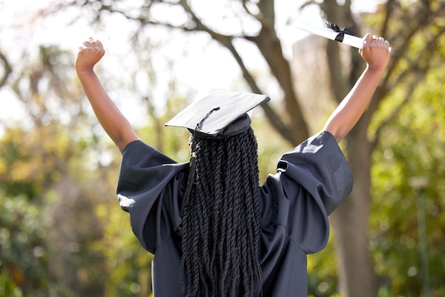 Photo back celebration and black woman outdoor graduation and diploma with success certificate and university female person graduate and girl outside event and degree with scholarship and achievement
