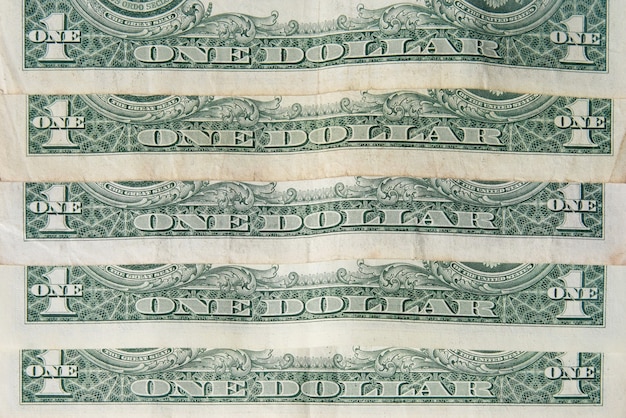 Foto indietro di uno sfondo di banconote da un dollaro
