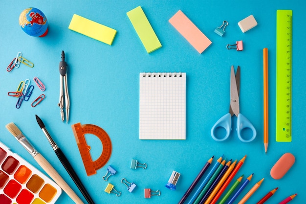 Back to school concept on blue texture paper background