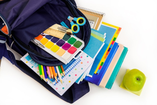 Back to school concept. Notebook stack and school pencils. Schoolchild and student studies accessories.