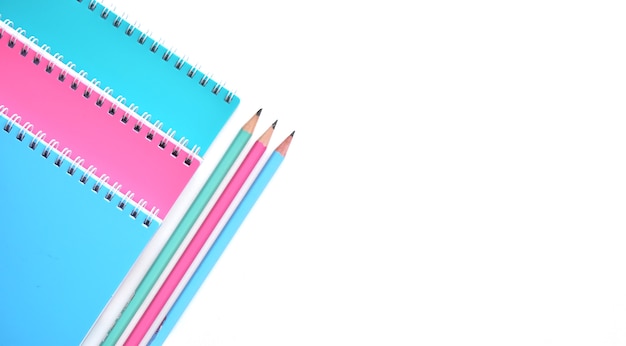 Photo back to school concept, school supplies, colorful pastel notebooks