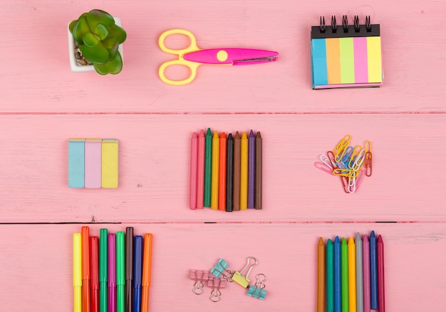 Back to school concept school supplies scissors eraser markers crayons and other accessories