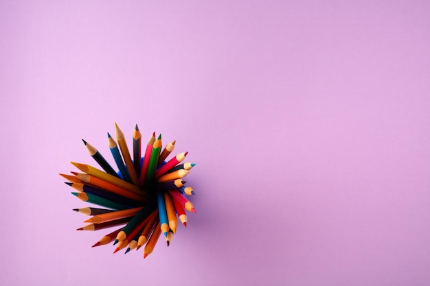 Back to school concept on violet texture paper background