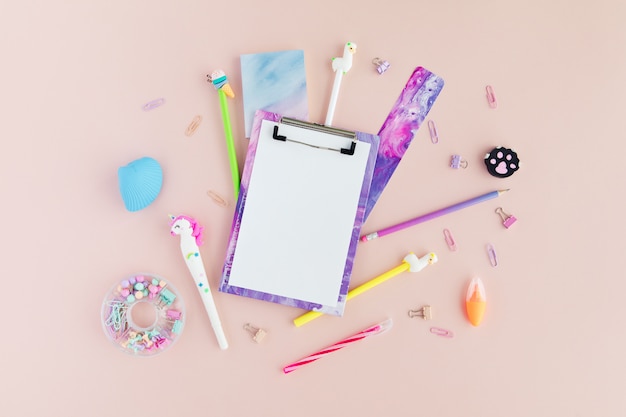 Back to school creative table desk with kawaii stationery, flatlay and top view