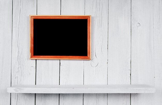 Back to school. Frame and a wooden shelf