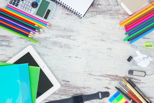 Back to school hero header with school supplies on wooden table