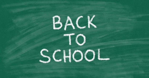 Back To School Inscription In Chalk On Green Board