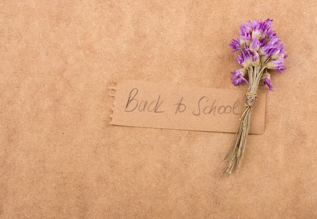 Back to school lettering with flower bouquet