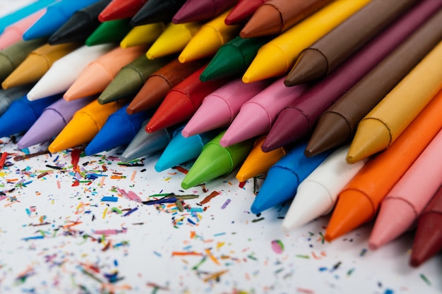 Back to school. Photo of wax crayons isolated on white background