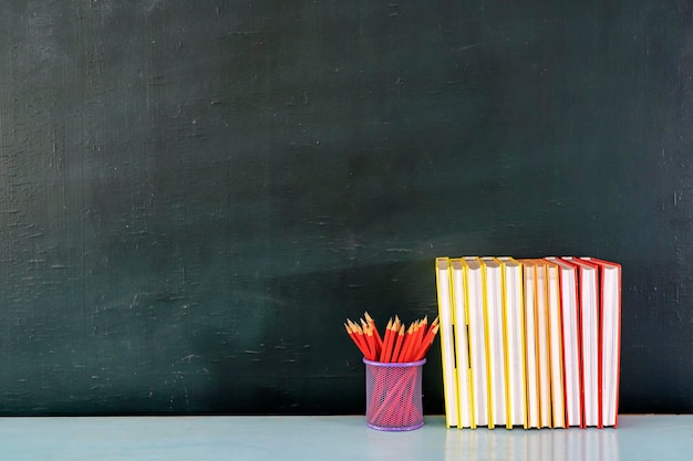 Back to school Red pencil accessory book and blackboard