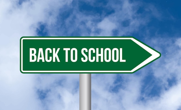 Back to school road sign on cloudy sky background