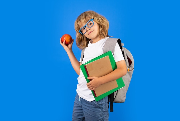 Back to school school child with book on isolated background