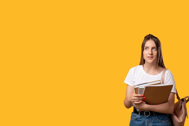 Back to school smart student curious young woman