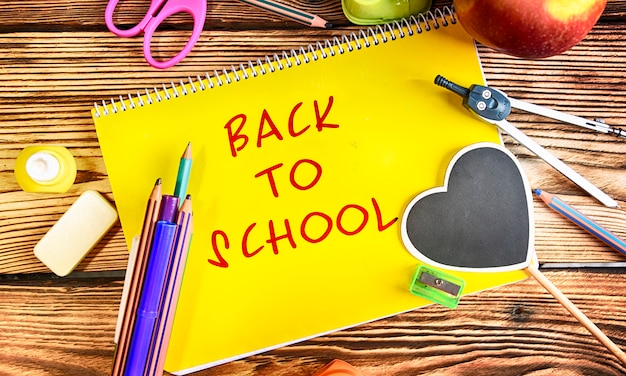 Photo back to school, supplies and blackboard.