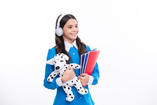 Back to school Teenager schoolgirl hold book with toy ready to learn School children on isolated