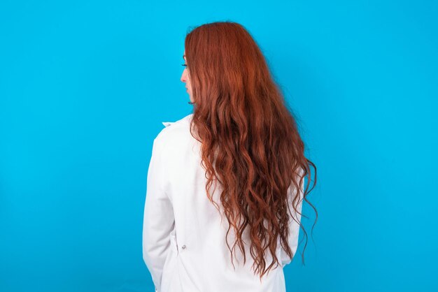 The back side view of a doctor woman studio shoot