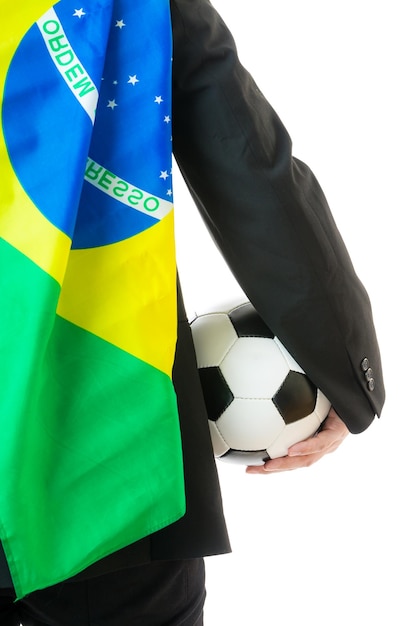 Back view of businessman with soccerball