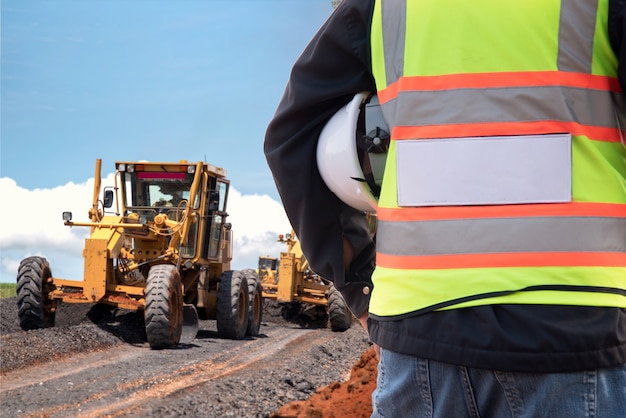 Back view civil engineer inspection construction road work 