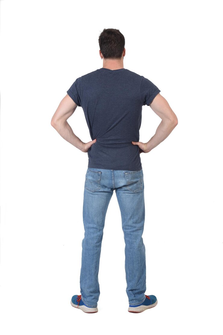 Back view of a full portrait of a man hands akimbo on white background