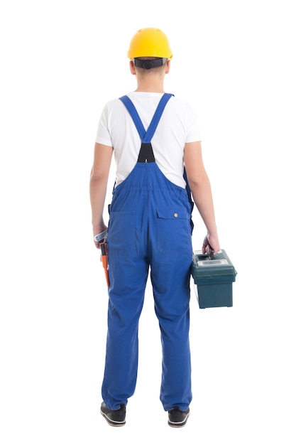 Back view of man in builder uniform and helmet with toolbox isolated on white background