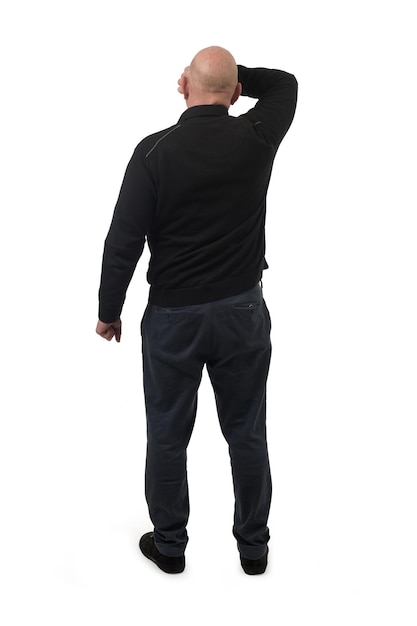 back view of a man covering her face with her arm on white background