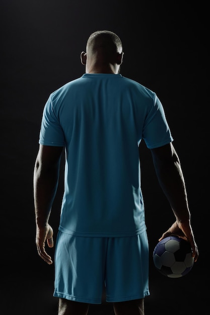 Back view of muscular football player