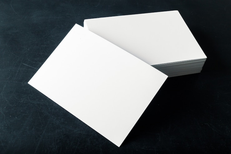Photo backed paper blank business cards on the stack