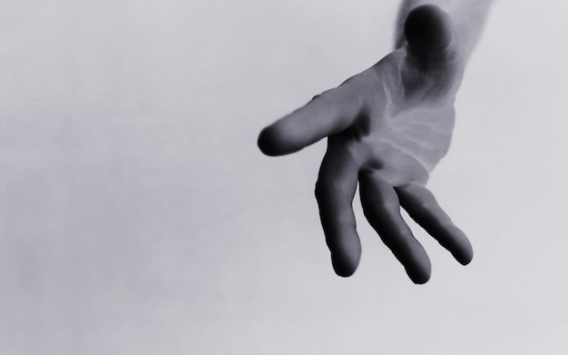 Background abstract gestures with fingers black hands on a\
white background gesticulation with hands