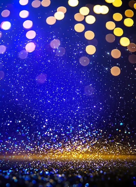 background of abstract glitter lights gold blue and black de focused